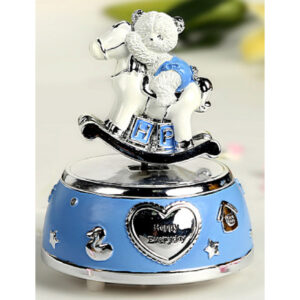 BLUE SHINING BEAR ON ROCKING HORSE